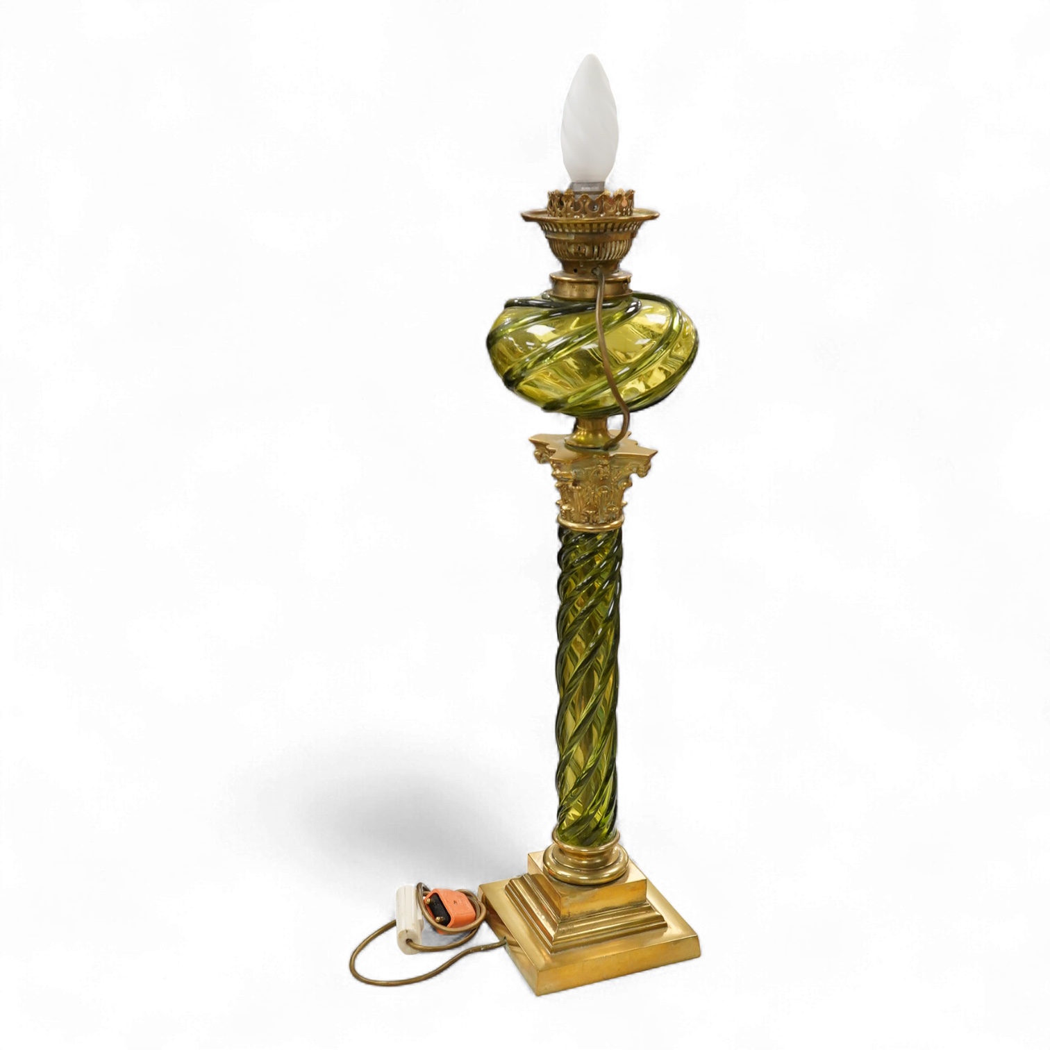 A 19th century gilt and brass green glass corinthian columned oil lamp by Messenger, 68cm high